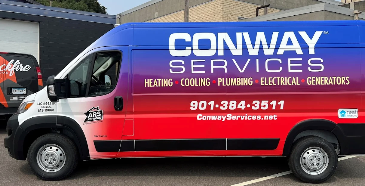 Conway Services plumber and HVAC van in Eads, TN, parked in the lot.