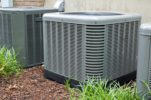 Air Conditioning units outdoors provide comfort for indoor occupants.