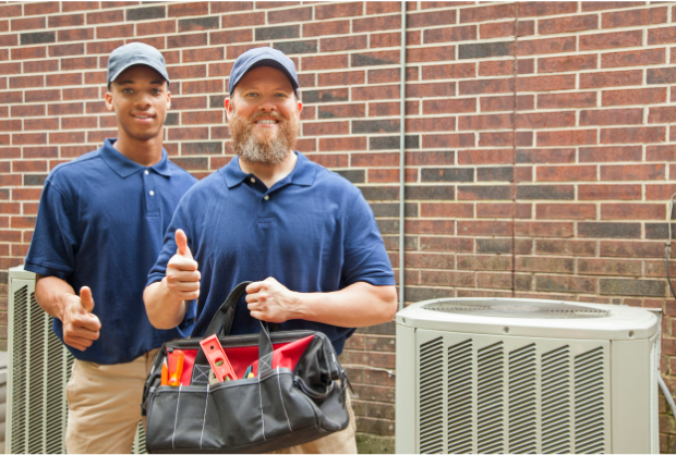 HVAC Technicians in Southaven, MS showing a thumbs up after a job.
